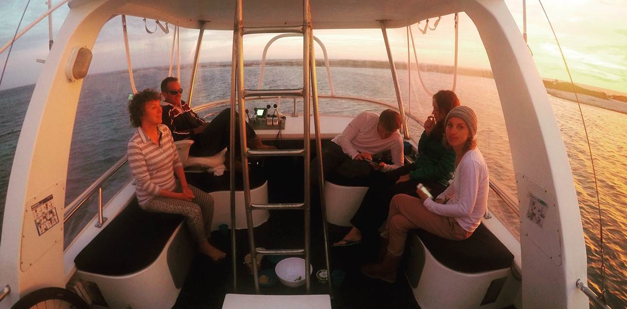 Dive Ningaloo - Top Deck sunset with customers